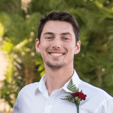brandon-funk Man with dark hair and a goatee smiling